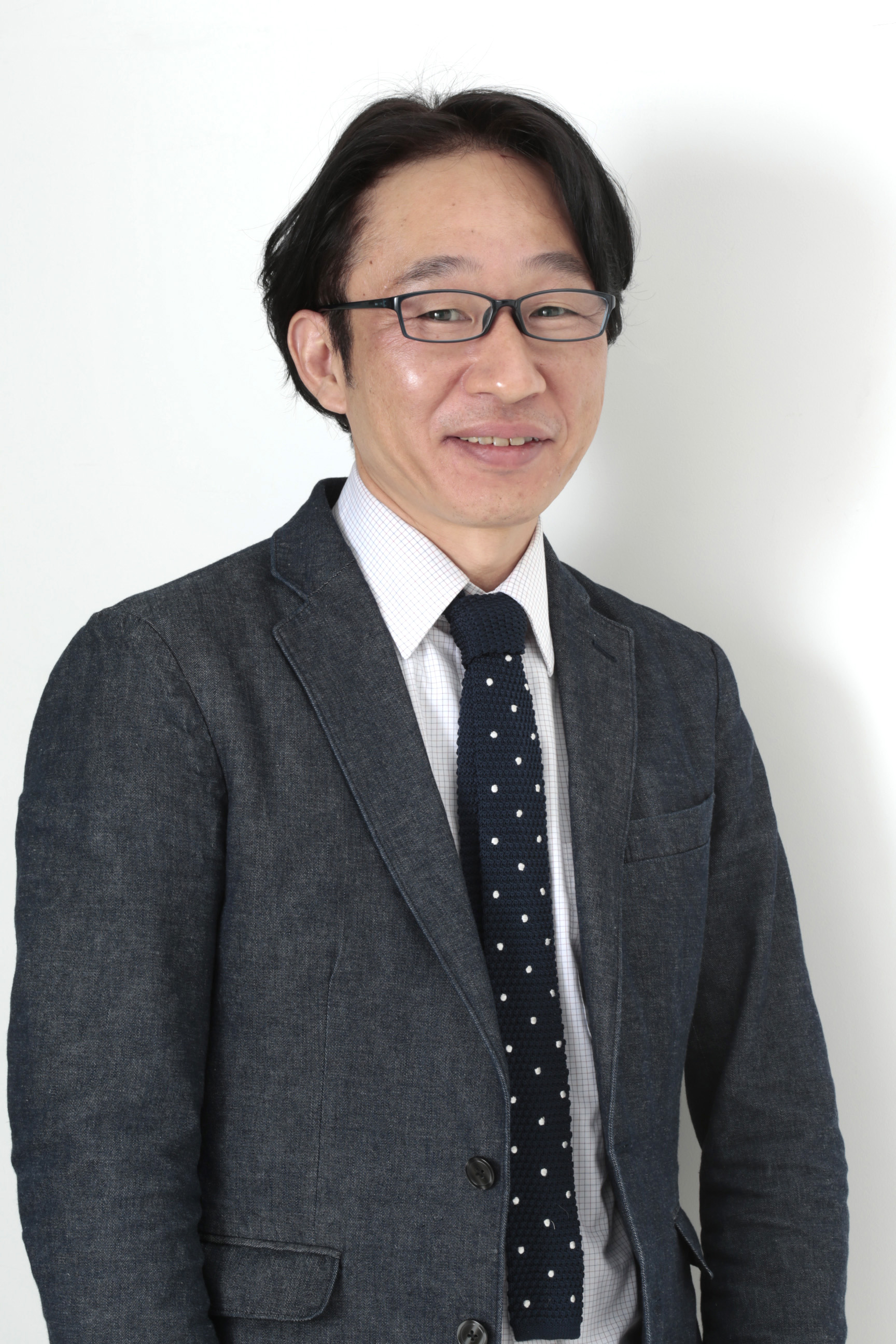 取締役小売部門統括部長　馬場郁夫